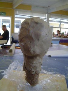 Covering the armature with wet clay