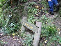 Start of Honeycomb steep climb from Careys Creek at Double Hill route sign. Bill's gaiters.