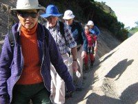 Traversing gut between gravel and bank. Marie from Toronto, Lex, Bill, Ria, Hazel