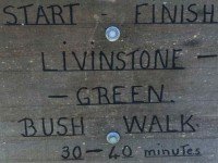 Sign indicating walk through QEII reserve on Coutts Gully Road.