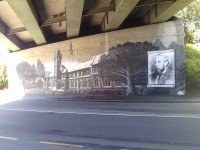 Clock tower mural under bridge. (Bruce pic and caption)