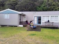 Lunch on the verandah of Jay's Bach at Taieri Mouth. (Margreet pic and caption.)