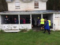 Sheltering from the rain for morning tea in the old Wardell's crib verandah.